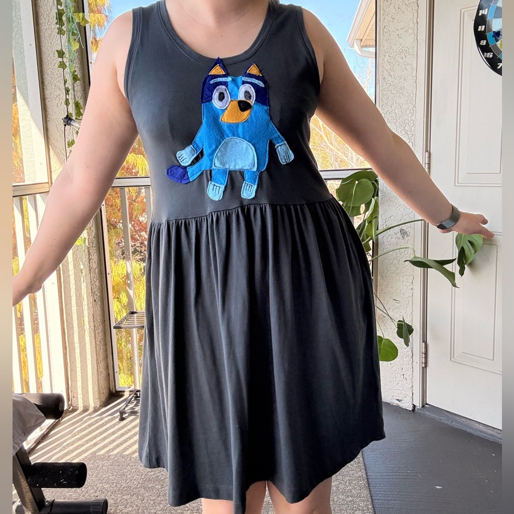 Upcycled Grey Dress with Blue Cartoon Character size S (fits up to medium)
